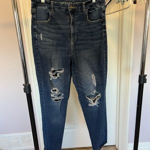 American Eagle curvy super high rise skinny jeans, medium wash, distressed.